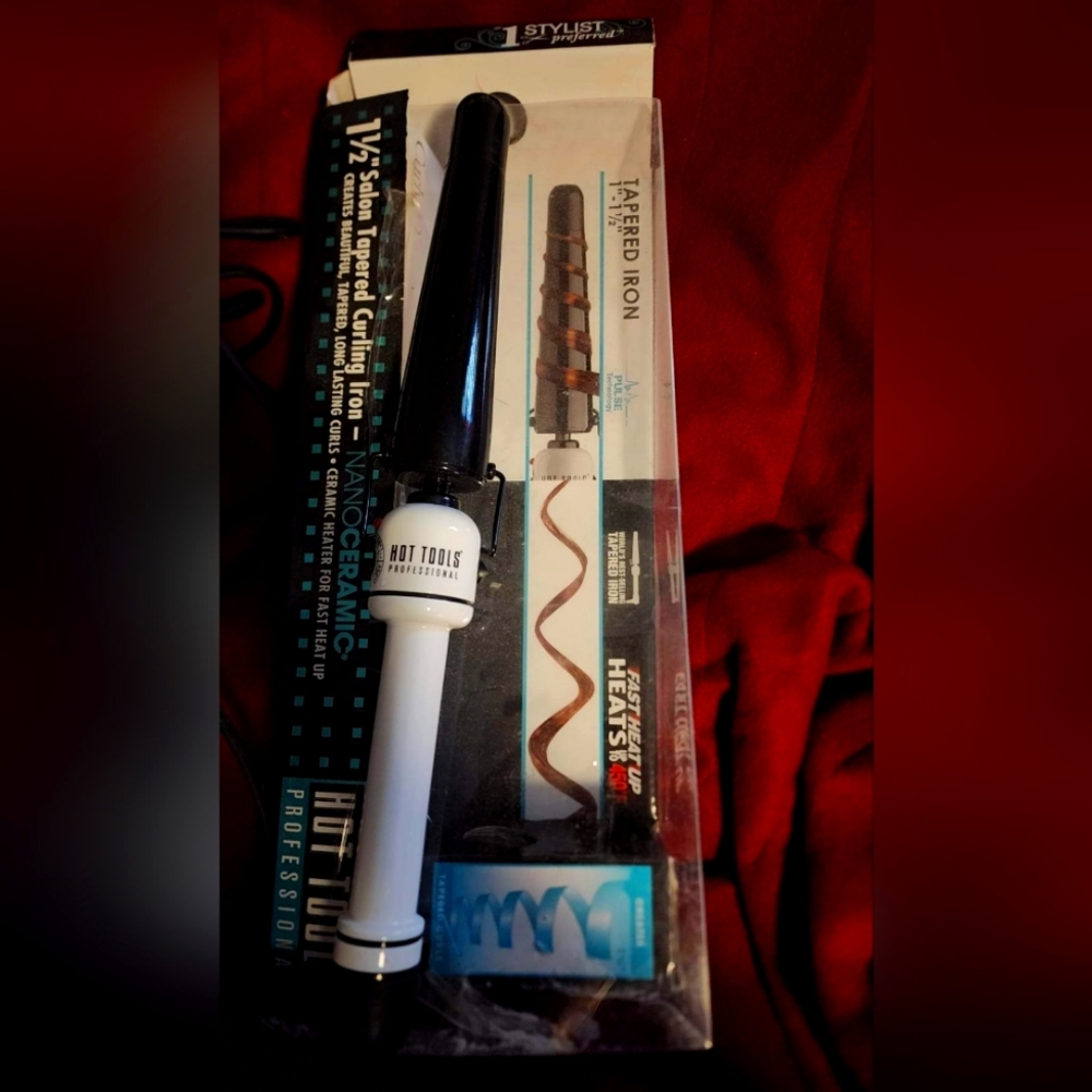 Hot Toold Tapered curling wand, no glove.  Used once. Didn't like the taper.